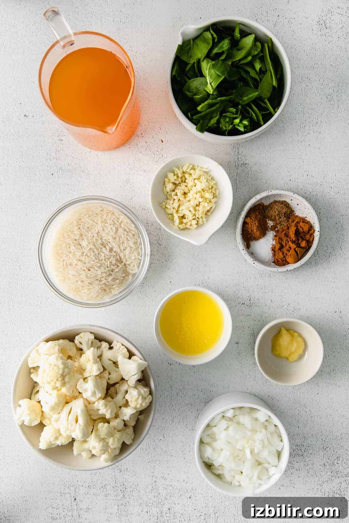 One-Pot Yellow Rice with Marinated Chickpeas Recipe 3 All the ingredients for one pot yellow rice in small bowls.