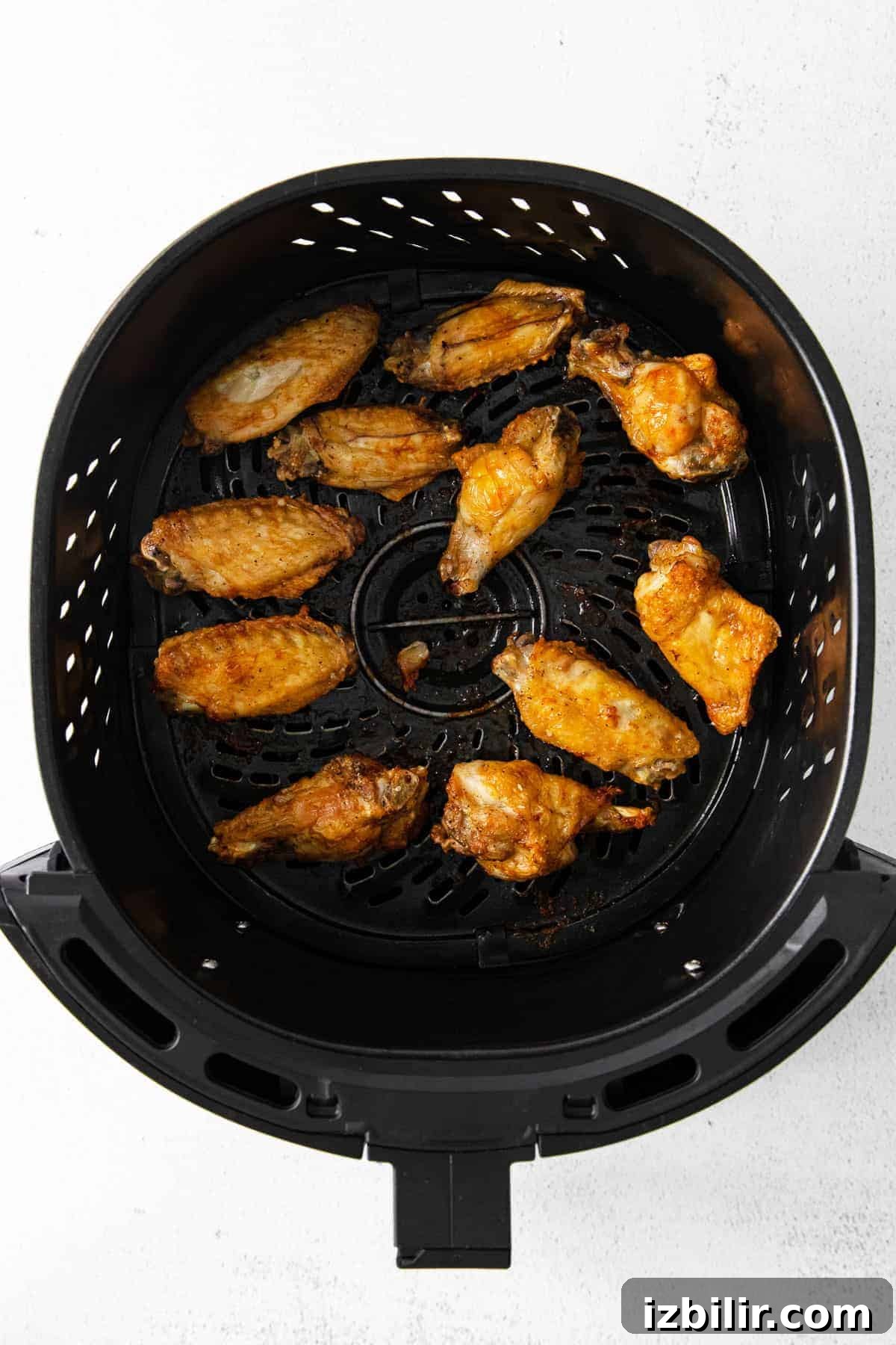 Chicken wings in air fryer.