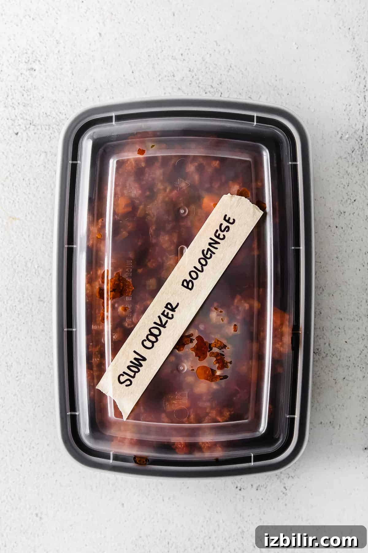 slow cooker bolognese in a freezer safe container