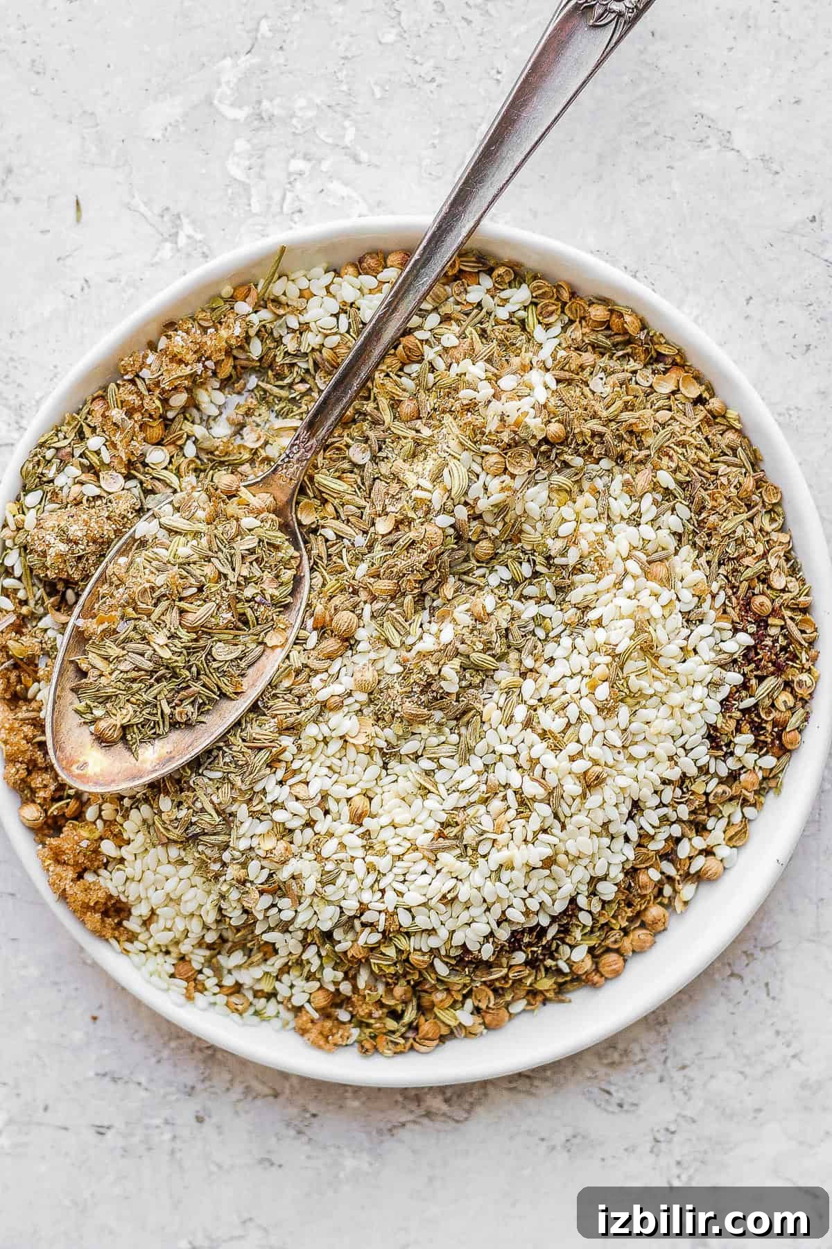 Za'atar seasoning on a plate za'atar seasoning on a plate with a spoon