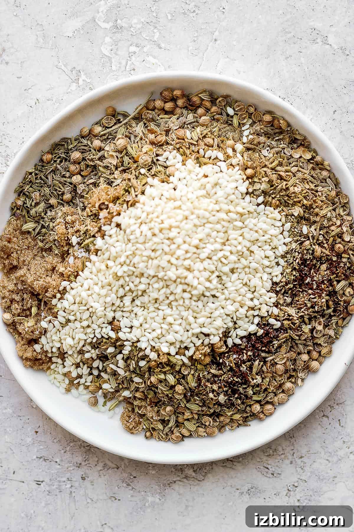 Za'atar on a plate ingredients for za'atar seasoning on a plate