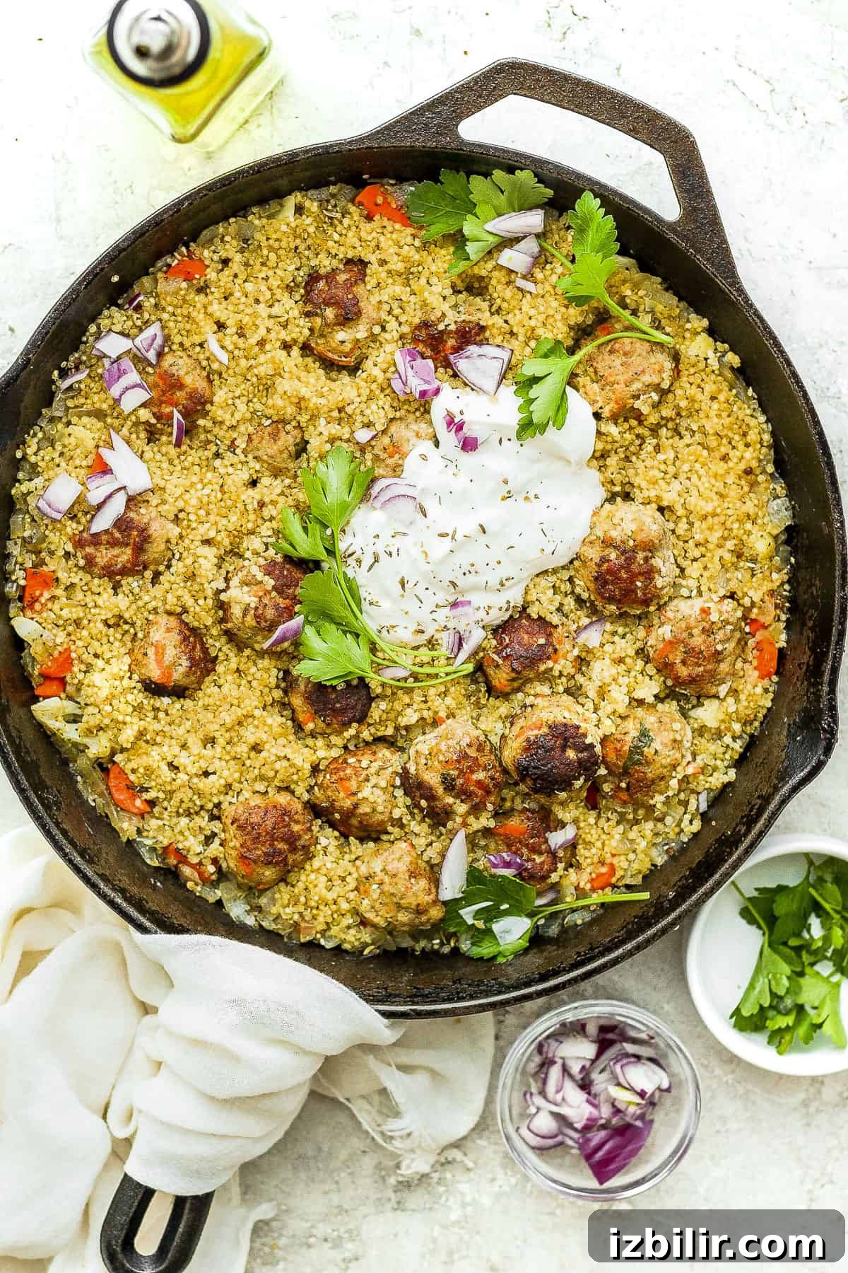 One-Pot Za'atar Meatballs and Quinoa in a cast iron