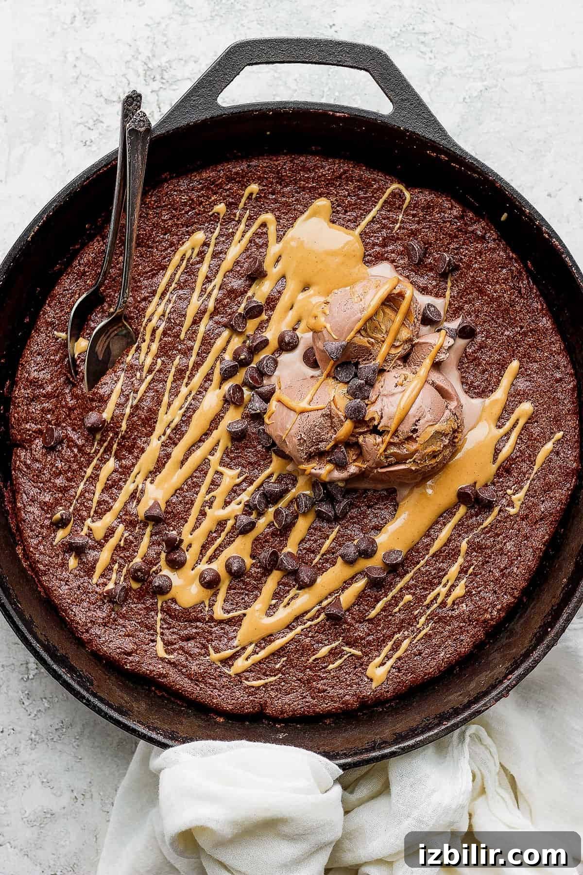 Flourless chocolate skillet cake with ice cream flourless chocolate skillet cake topped with ice cream and mini chocolate chips