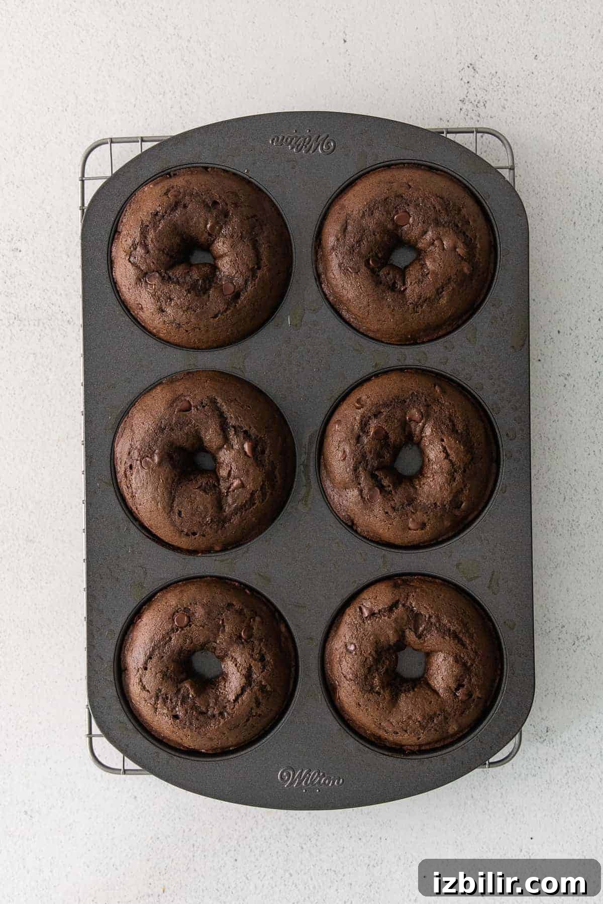 Donuts baking in a pan donuts in donut pan