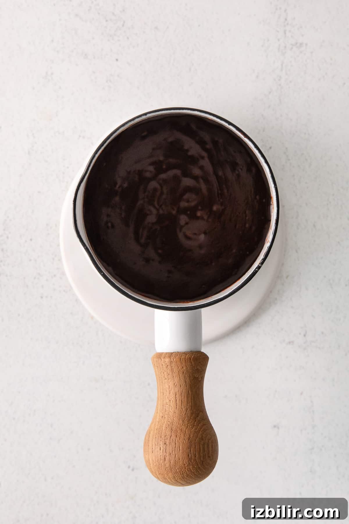 Chocolate glaze in a container chocolate glaze in container