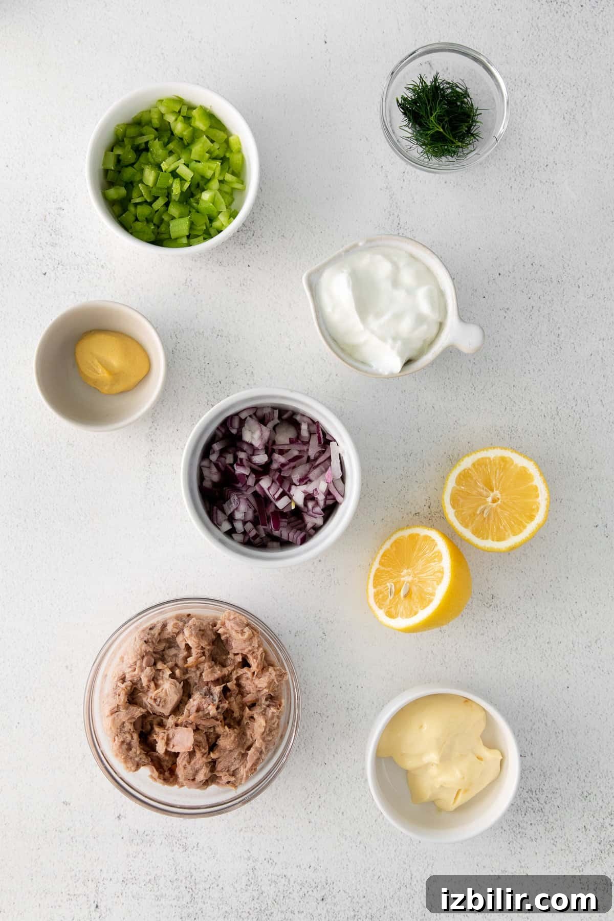 Ingredients for a quick healthy tuna salad. Ingredients for tuna salad in bowls.