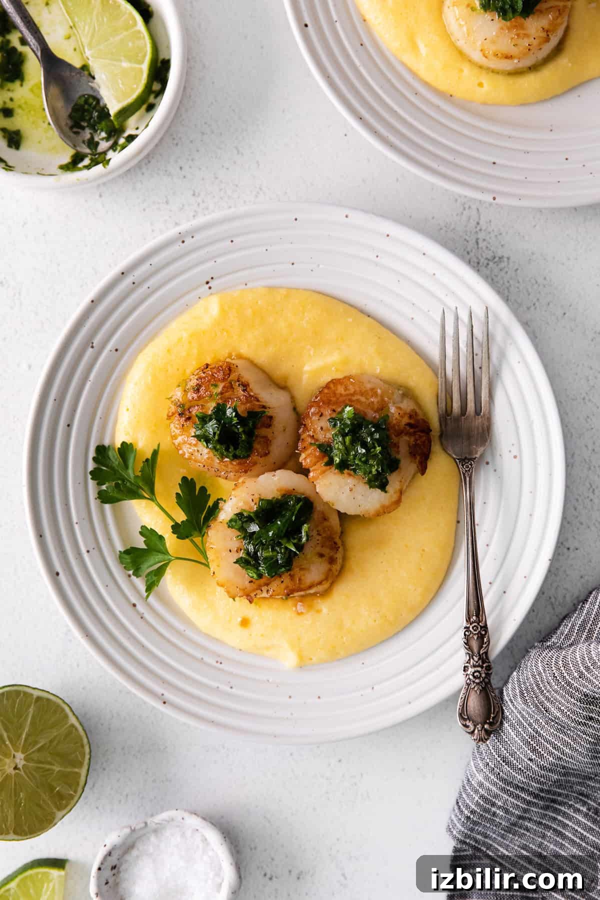 Pan seared scallops served over polenta.