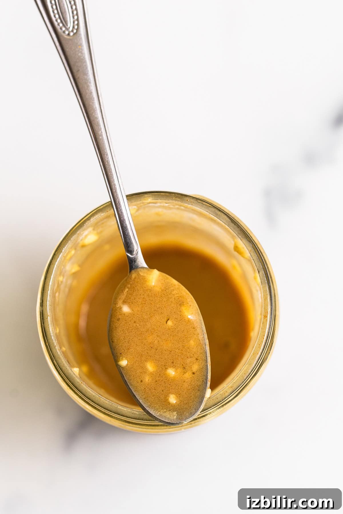 French Carrot Salad with Honey-Mustard Dressing Recipe 4 Honey mustard dressing in a mason jar.