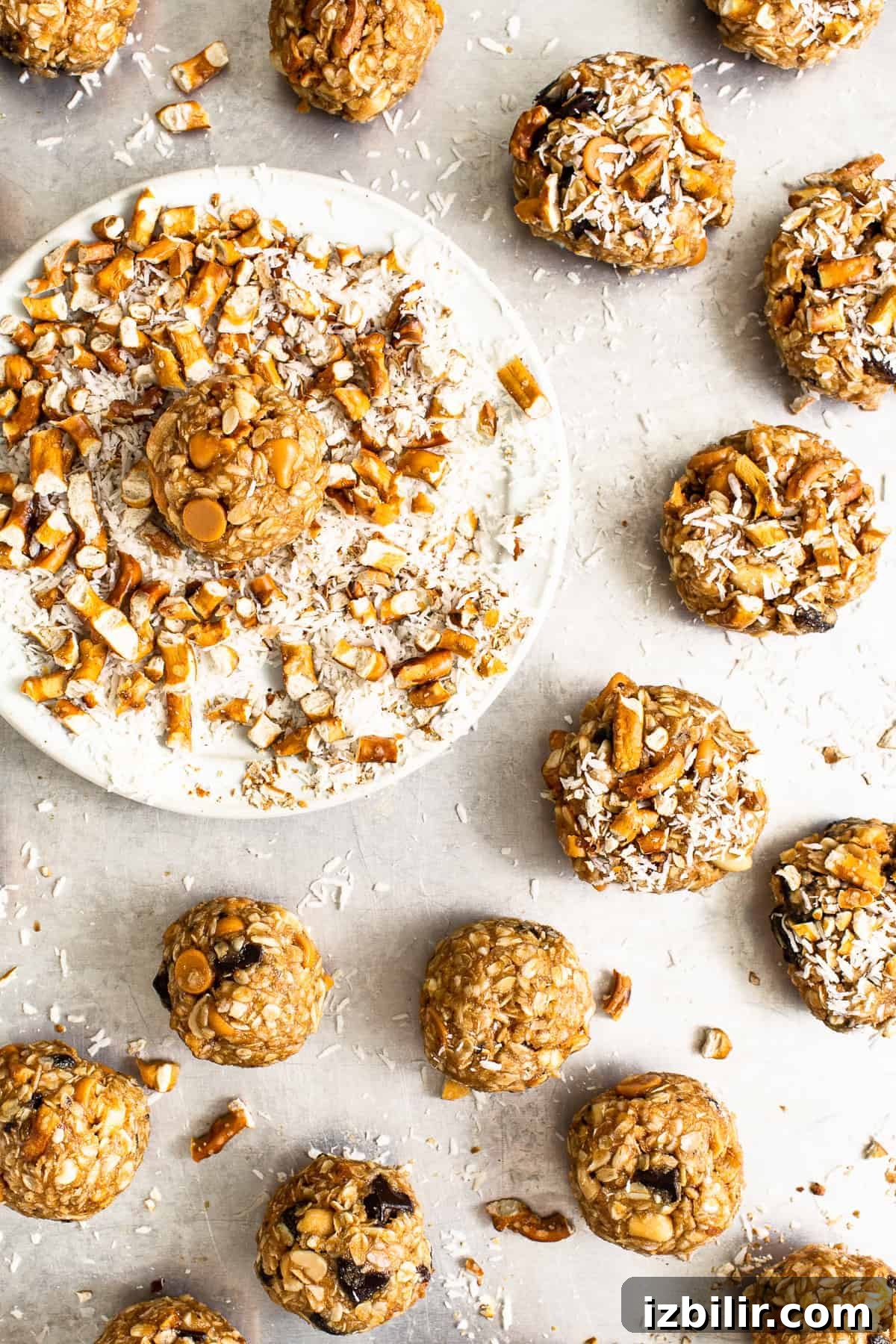 Roll dough in extra toppings if desired kitchen sink cookie dough balls rolled in pretzels and coconut