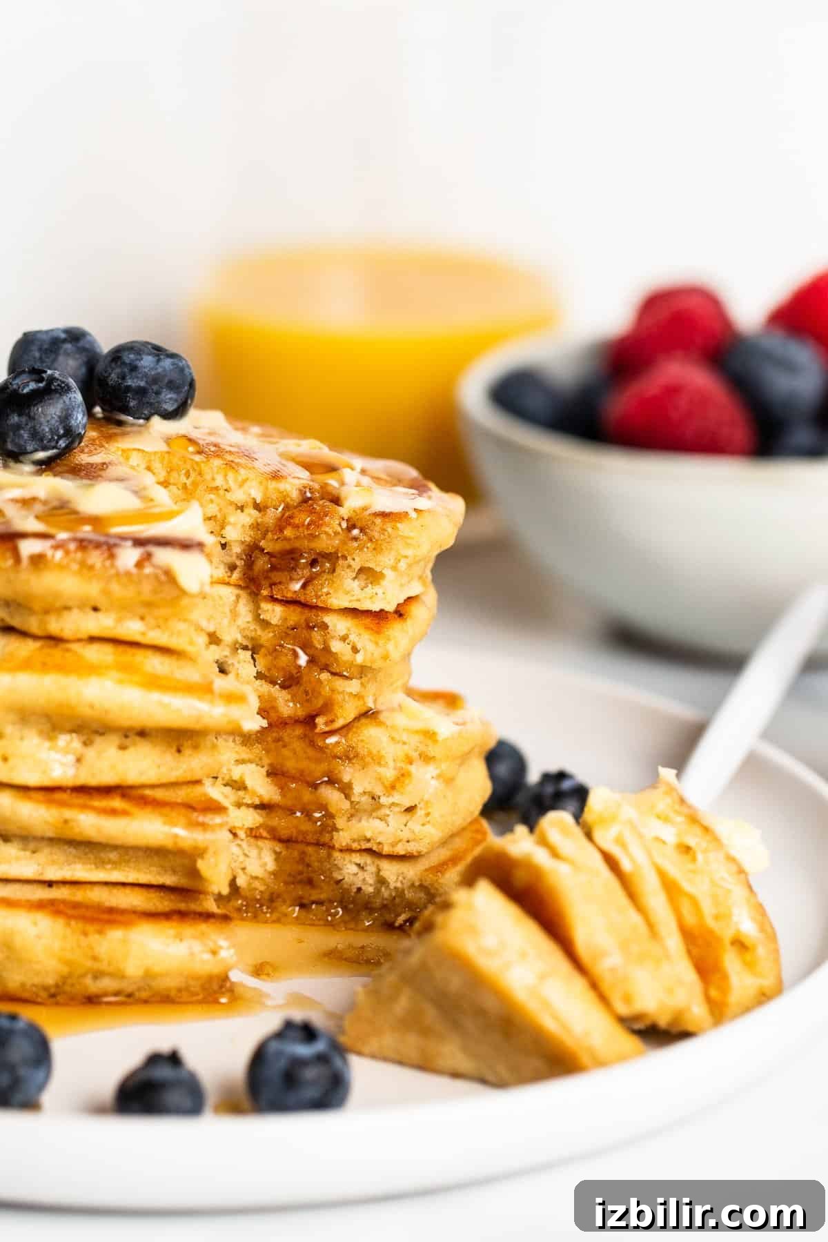Homemade Fluffy Pancake Recipe for Light, Tender Stacks 7 forking pancakes fluffy