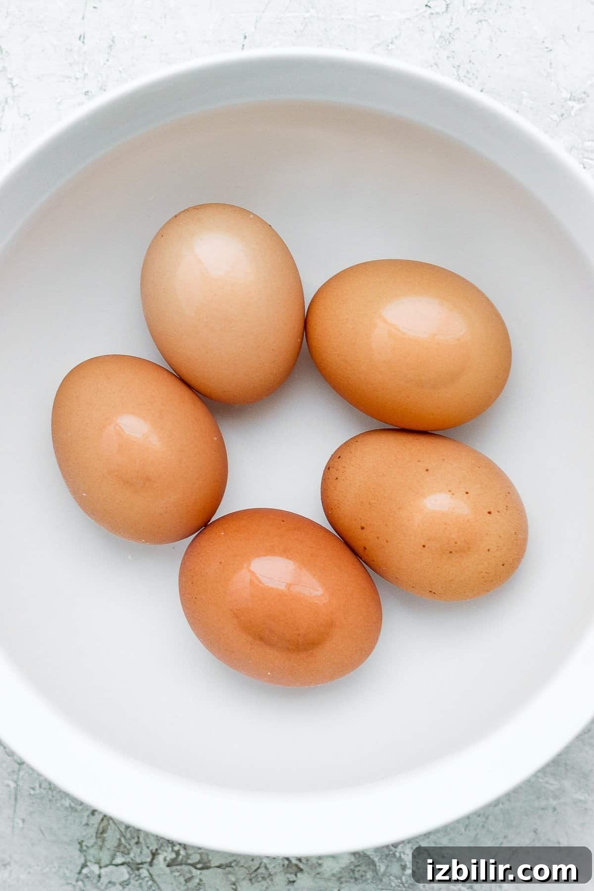 Classic Nicoise Salad Recipe 5 Eggs in a water bath.
