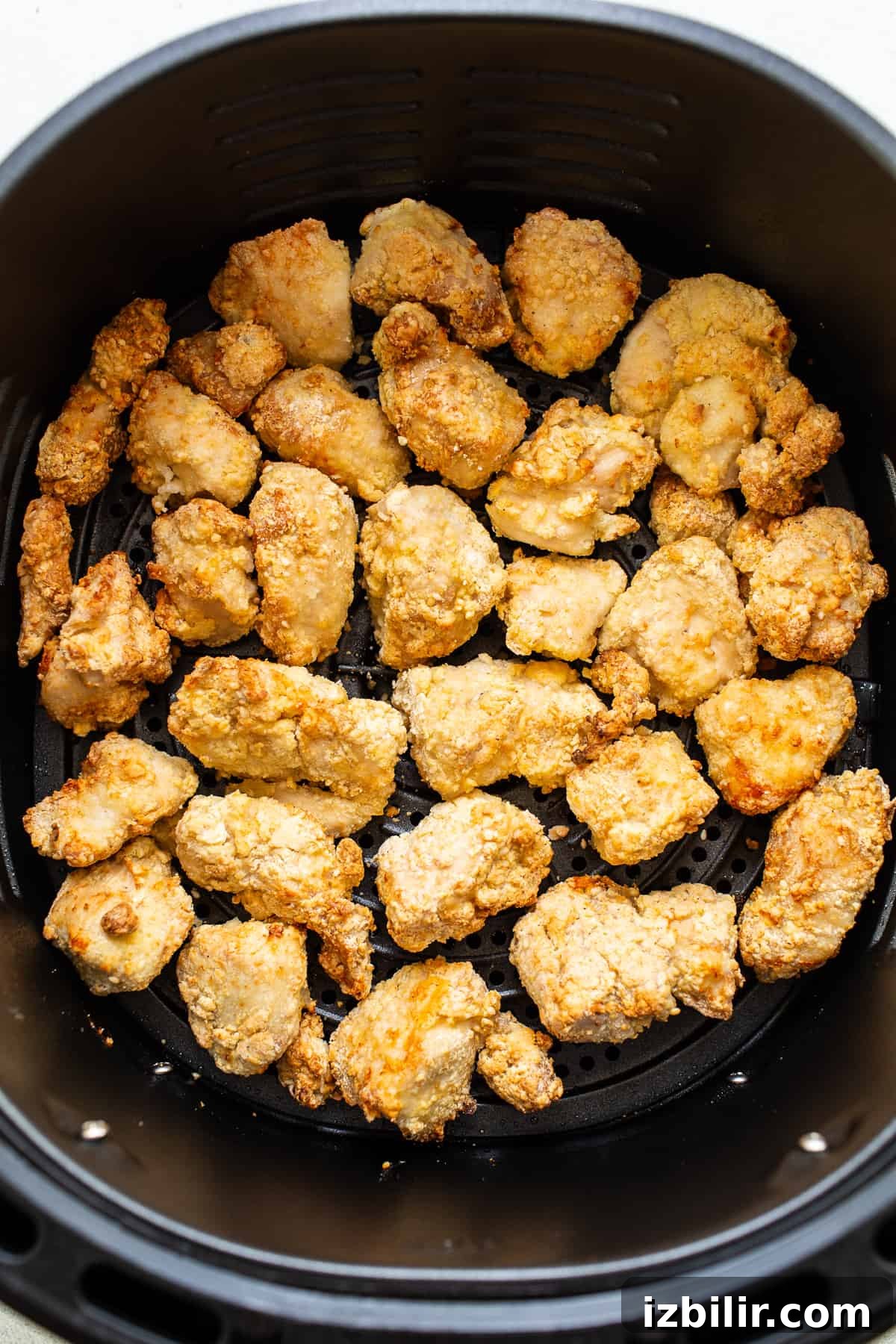 Chicken cooking in the air fryer chicken in air fryer