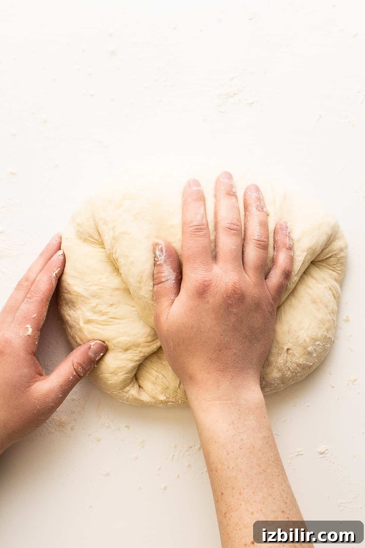 Kneading pizza dough hand kneading dough on surface