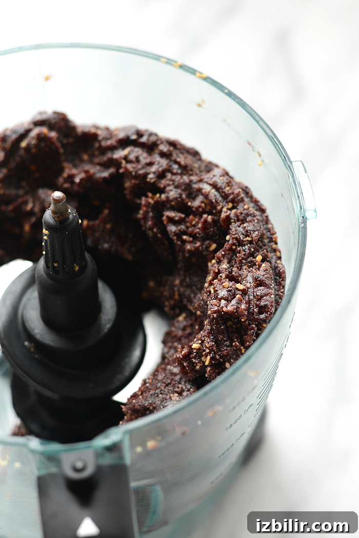 Make these delicious clean eating blueberry truffles for a sweet treat made with dried fruit and dark chocolate!