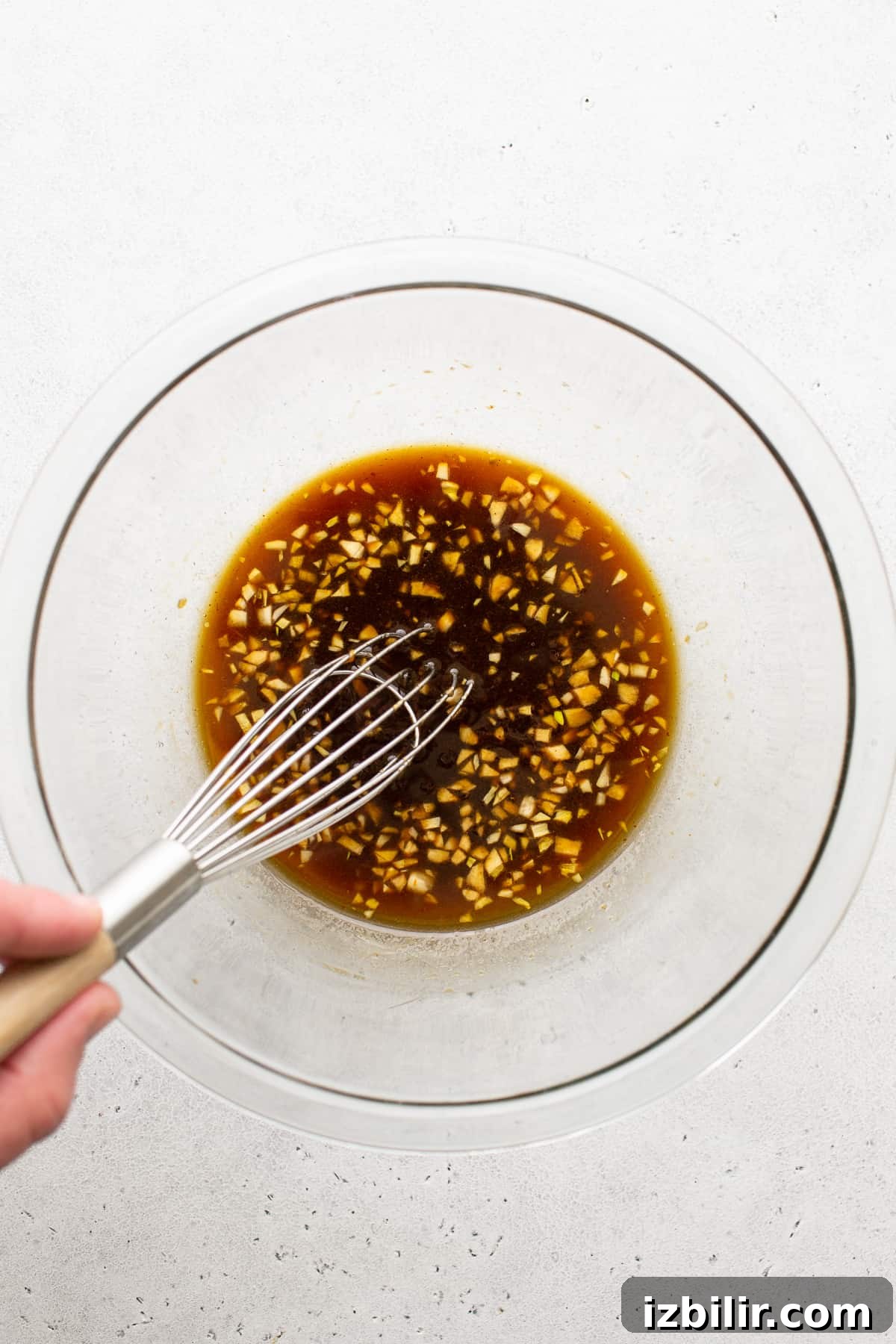 This chicken kebab marinade is made with soy sauce, Worcestershire sauce, orange juice, and fresh garlic. It will make your chicken so juicy! marinade in bowl.