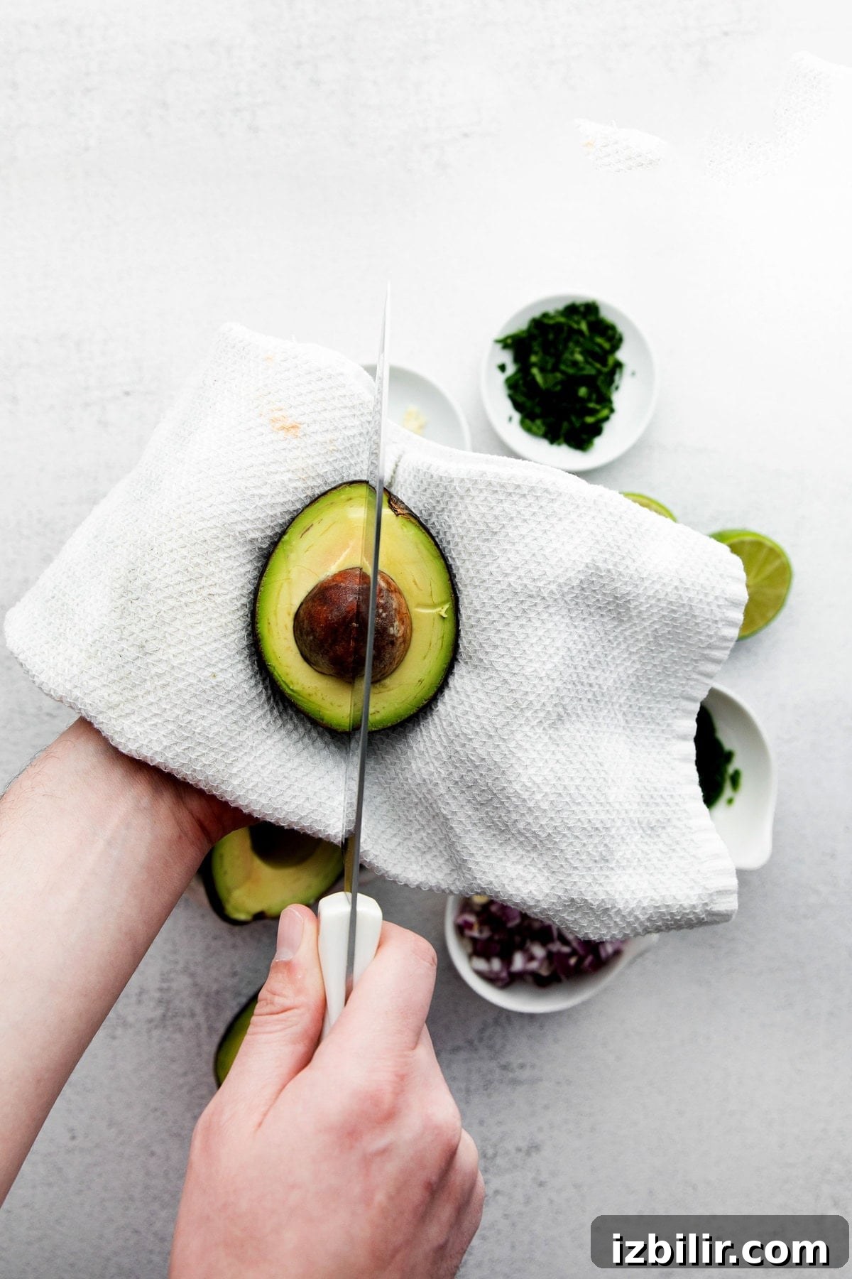avocados sliced on cutting board