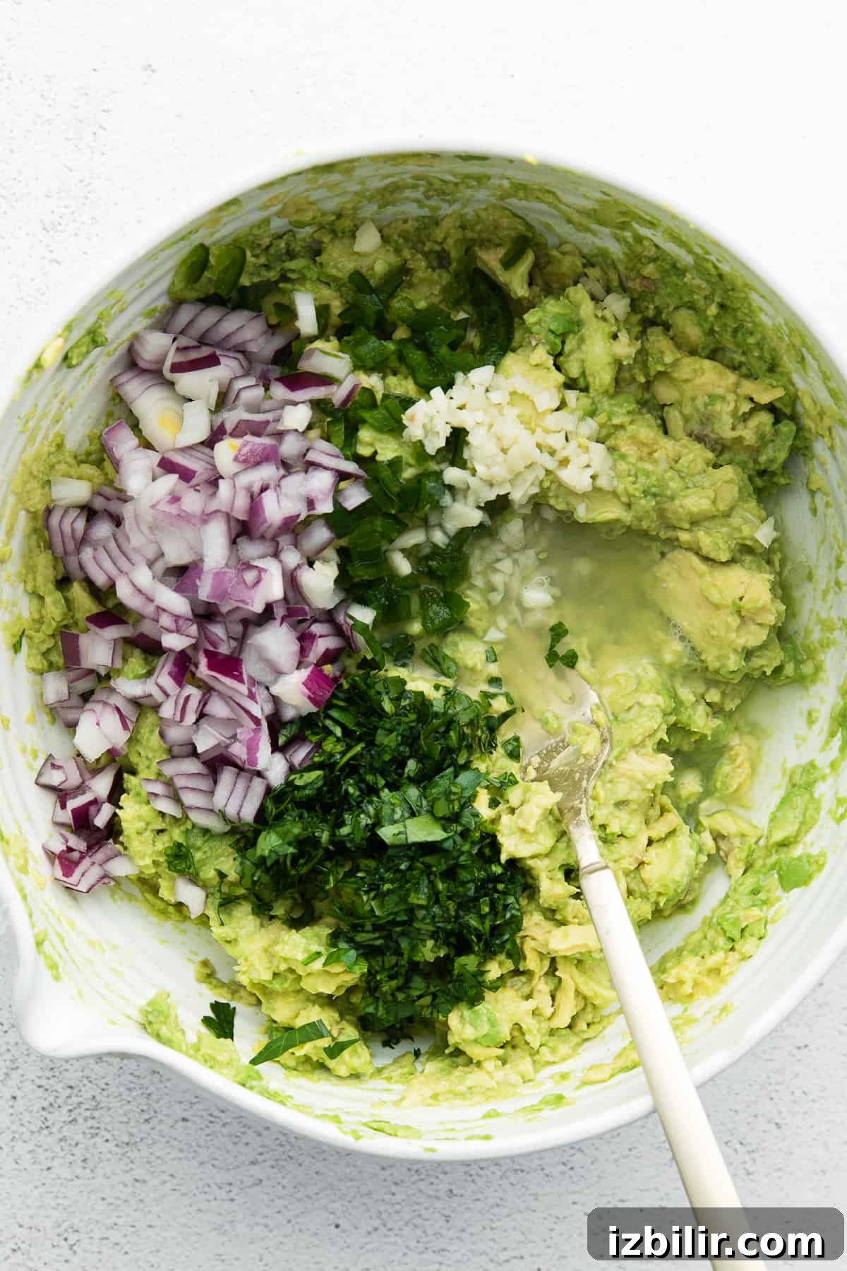 ingredients in bowl for guacamole