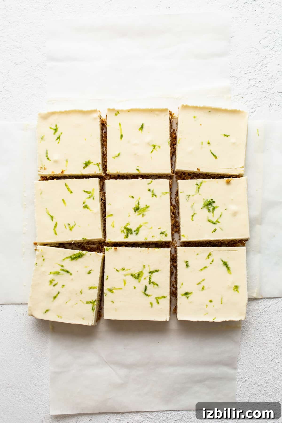 Sliced margarita pie bars. sliced bars on parchment paper.