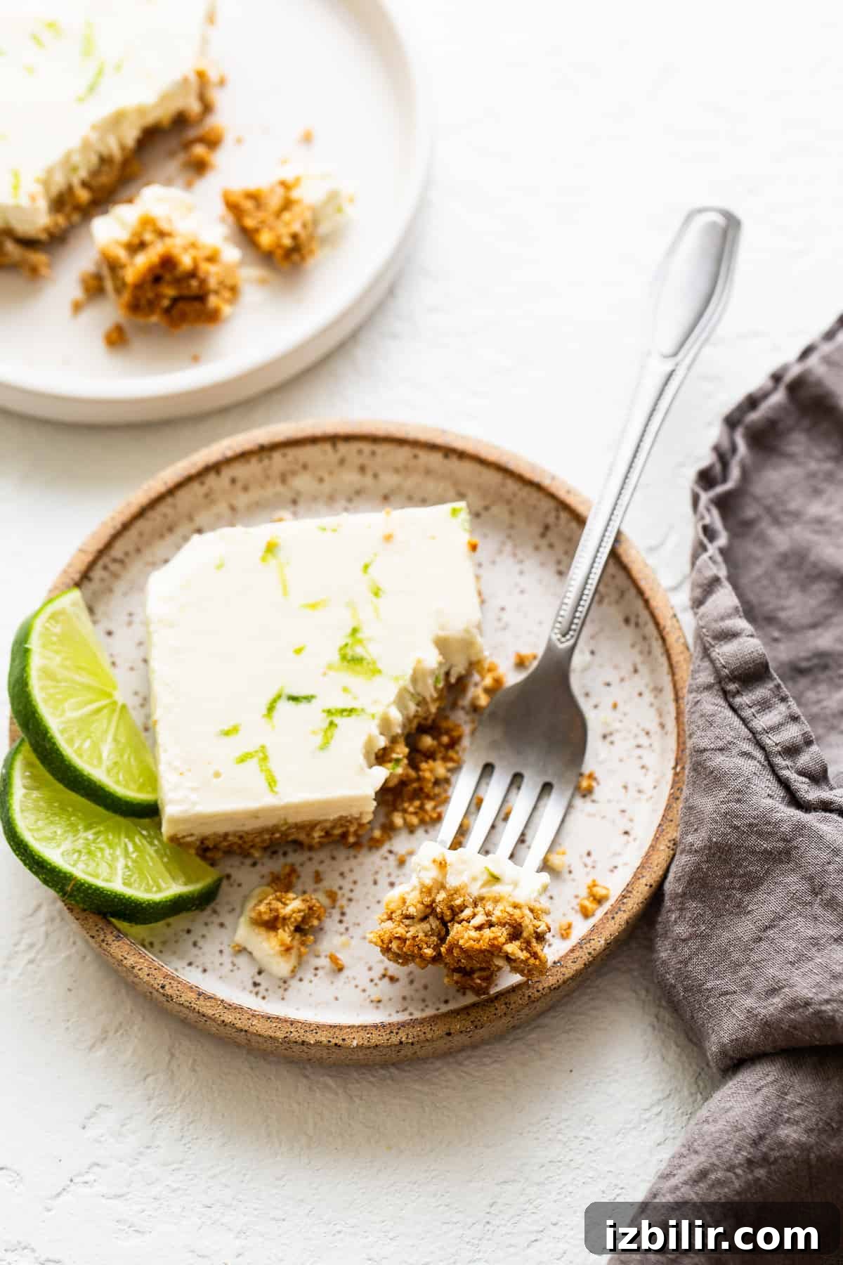 Margarita pie bar served on a plate. bar on plate with fork.