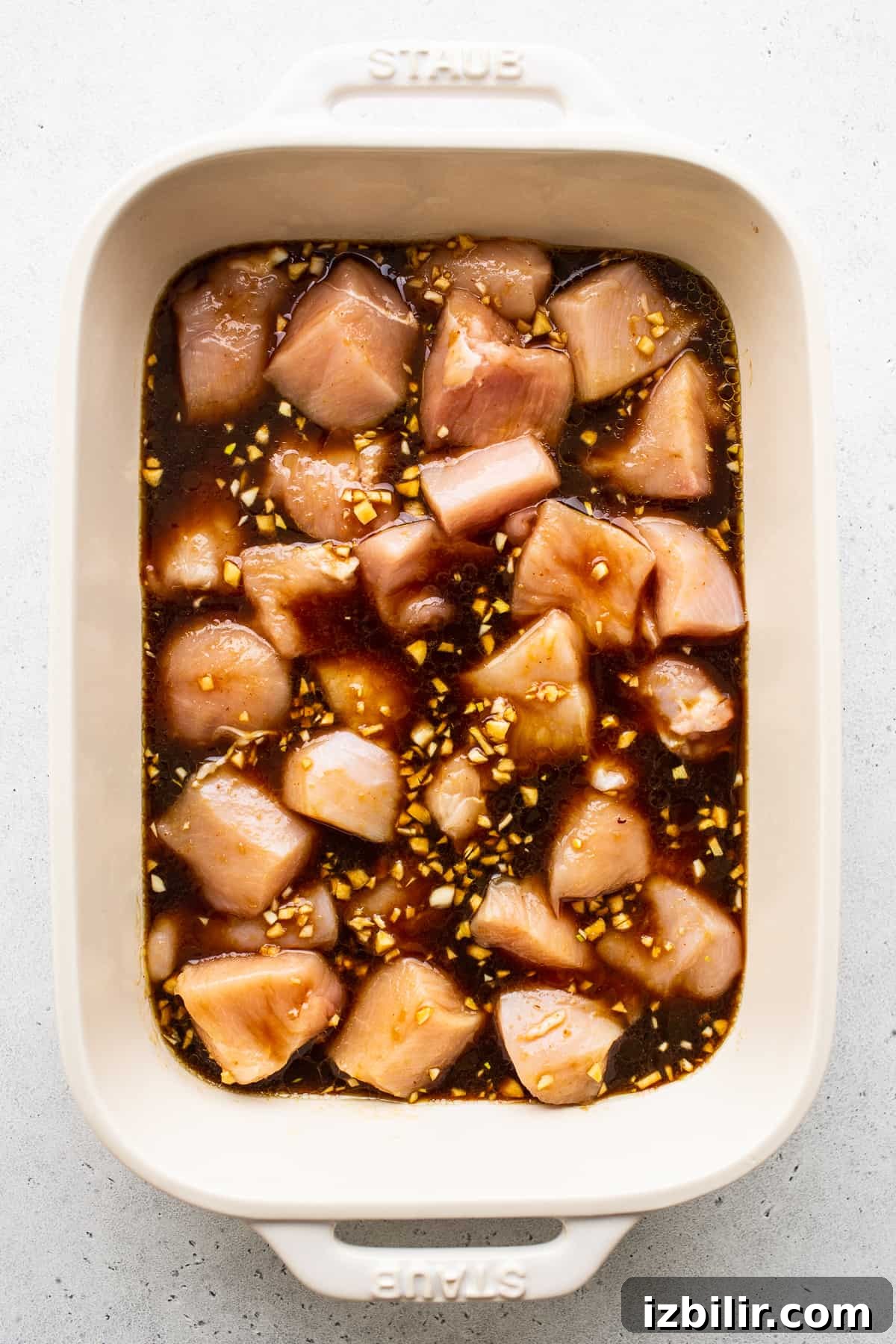 Chicken marinating Chicken marinating in dish.
