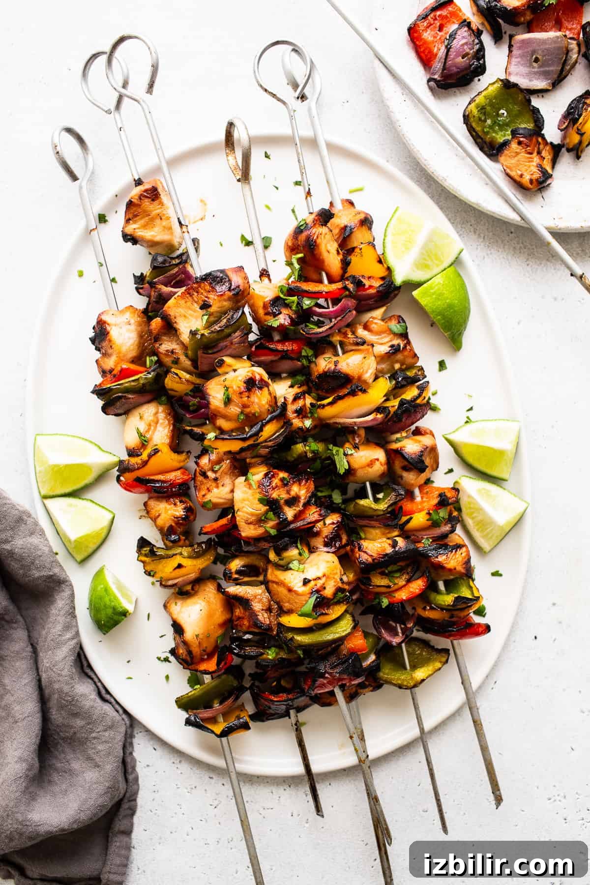 Chicken kabobs plated Chicken kabobs on a plate.