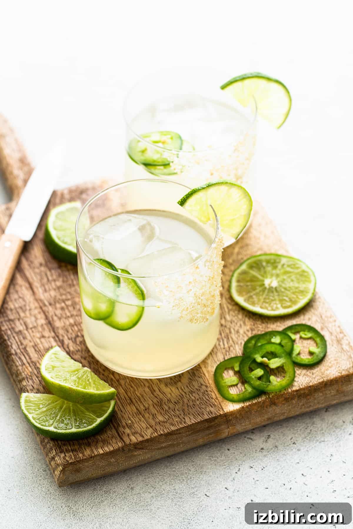 Spicy mezcal margaritas in a glass.