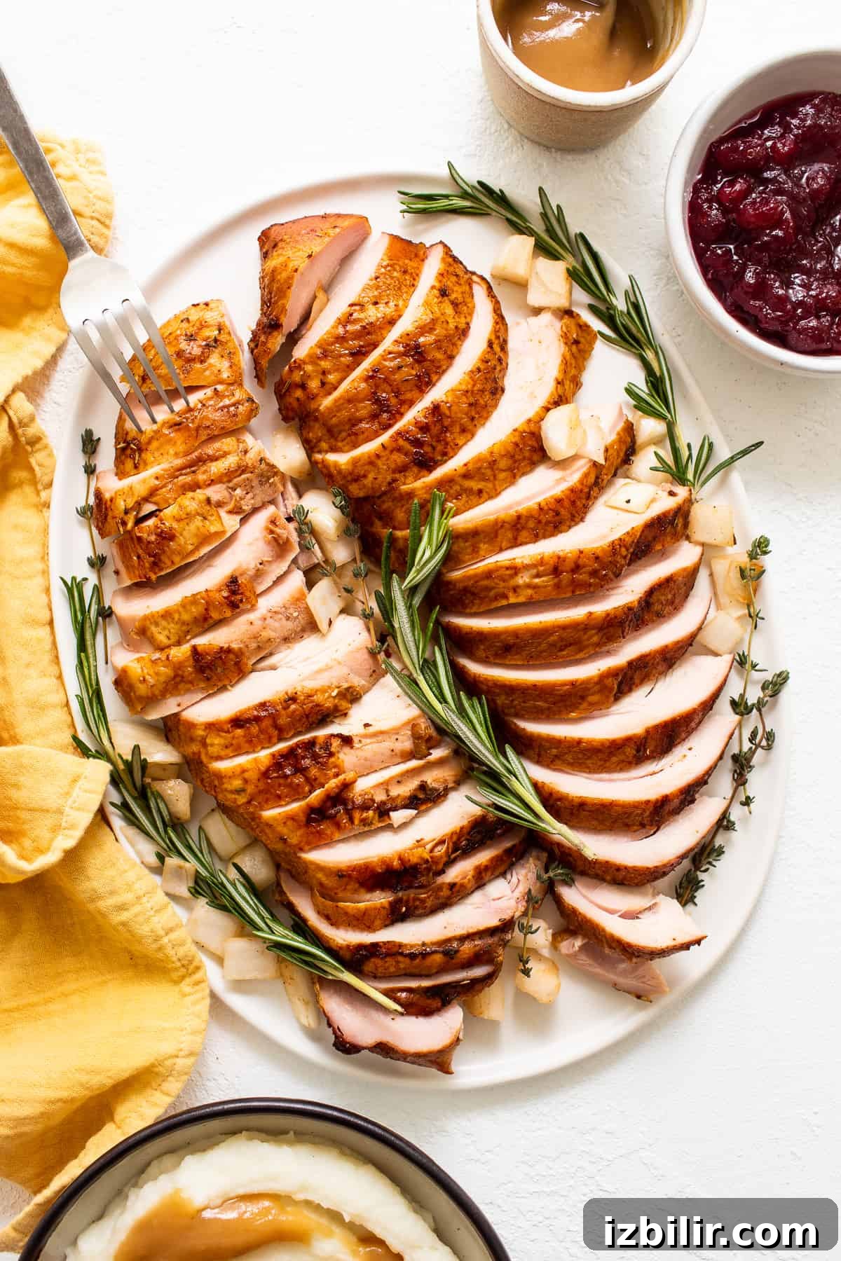 Smoked Turkey Breast Recipe for Juicy, Flavorful Meat 5 Smoked turkey breast sliced on a plate.