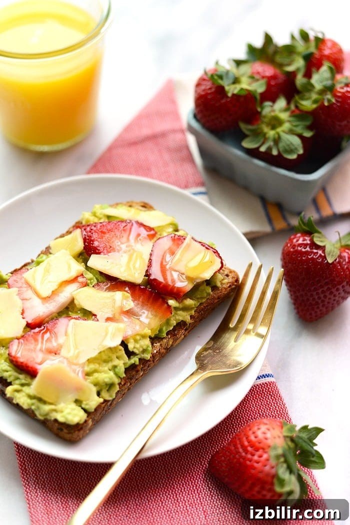 Jazz up your toast with some fresh fruit and cheese for an epic breakfast of Strawberry, Avocado, and White Cheddar Toast!
