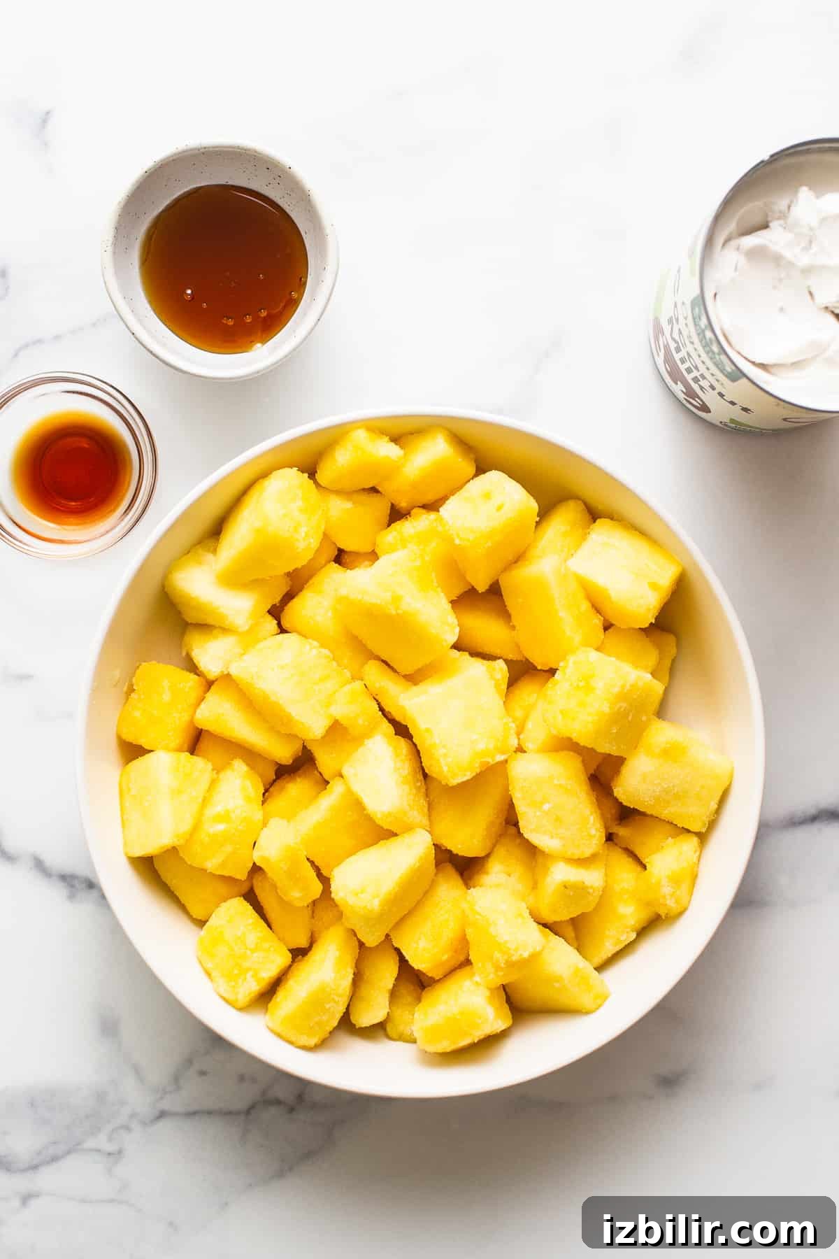 Ingredients for Dole Whip in bowls.