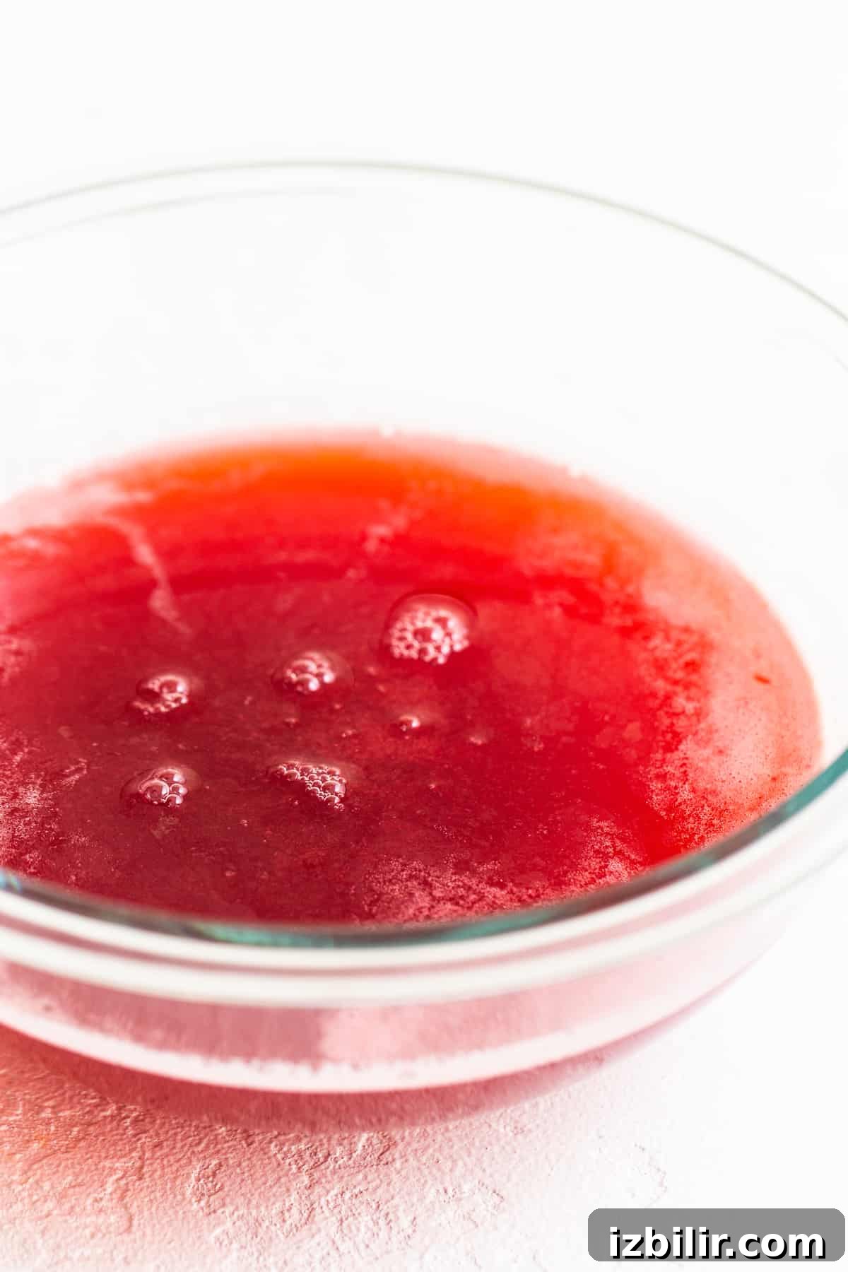 Honey raspberry juice in bowl honey raspberry juice in bowl.