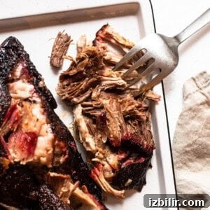 Smoked Pulled Pork Tacos Recipe with Chipotle Lime Slaw 3 Smoked Pork Shoulder on a tray.