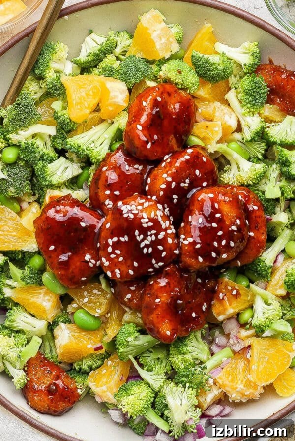 Bowl with salad and glazed plant-based meatballs