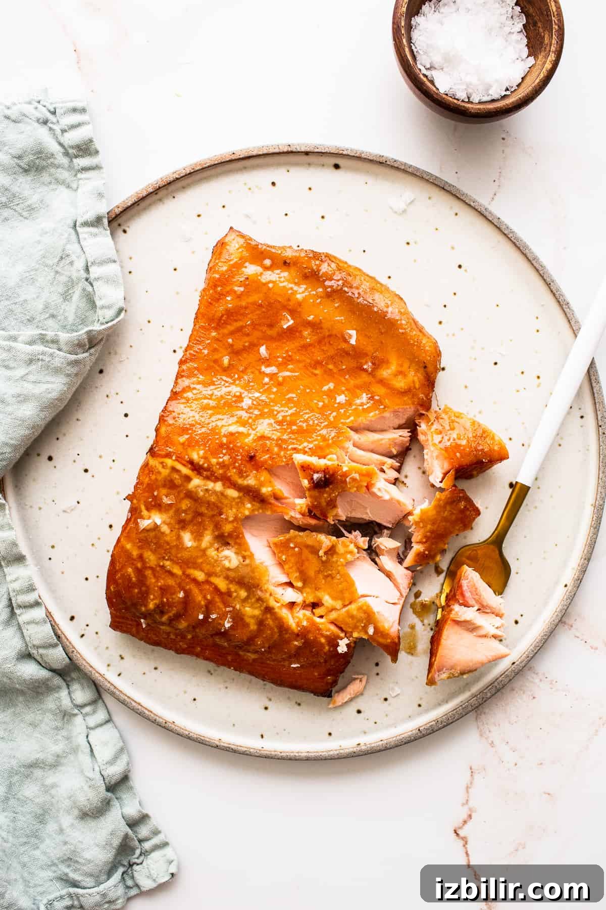 Smoked Salmon with Maple Mustard Glaze 2 Smoked salmon on a plate with a fork.
