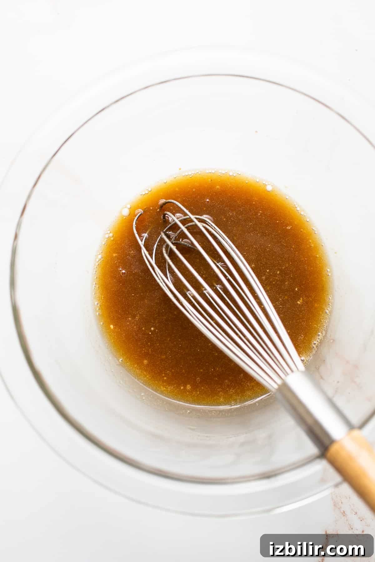 Smoked Salmon with Maple Mustard Glaze 5 Salmon marinade in a clear bowl.