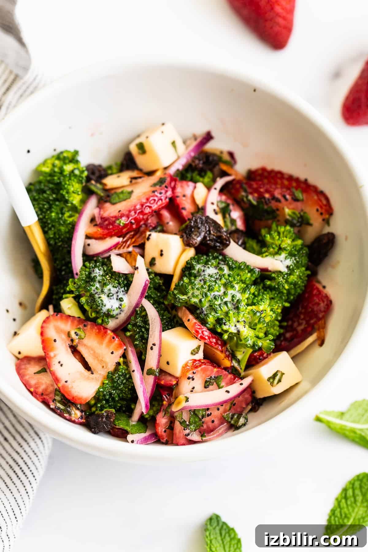 Fresh Strawberry Broccoli Salad Recipe with Poppy Seed Dressing 7 Strawberry broccoli salad in a bowl.