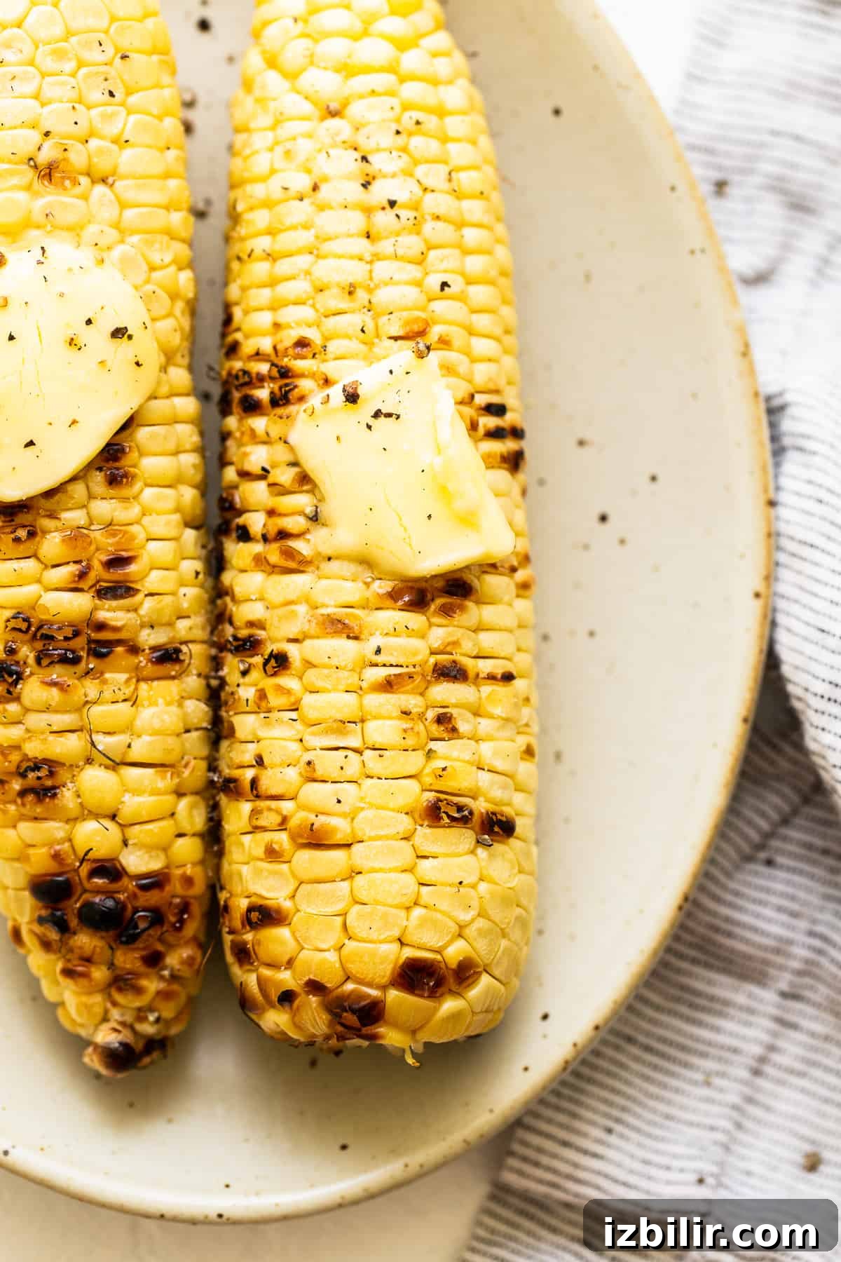Grilled corn with butter and salt grilled corn on the cob with butter and salt