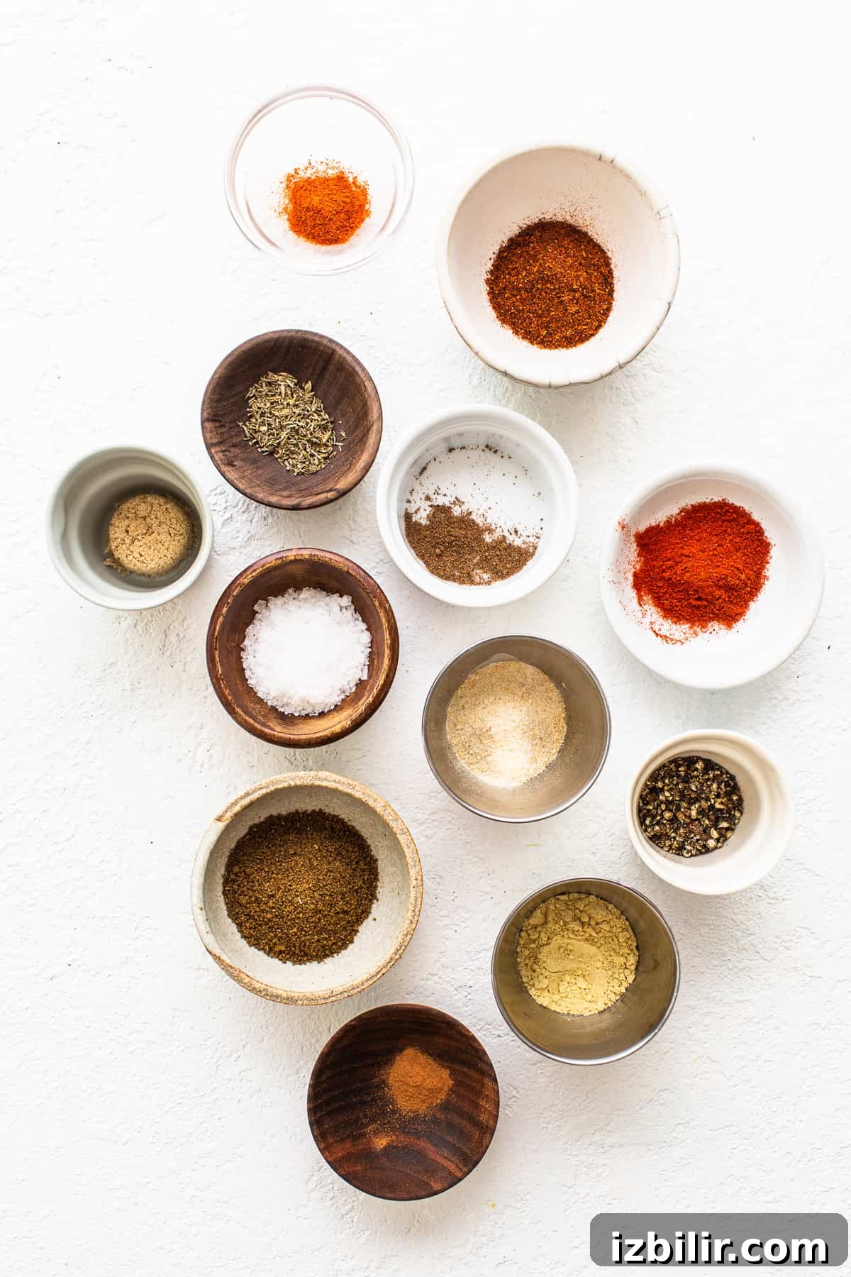different spices in small bowls.