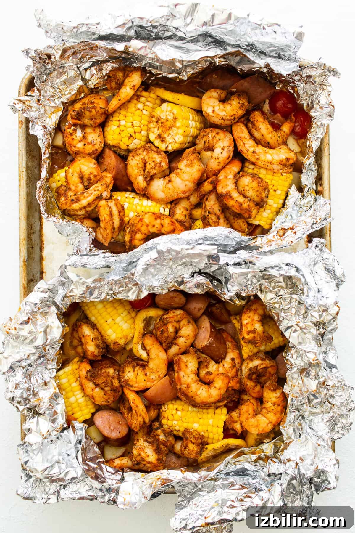 All of the ingredients for these shrimp packets go into two foil packs.