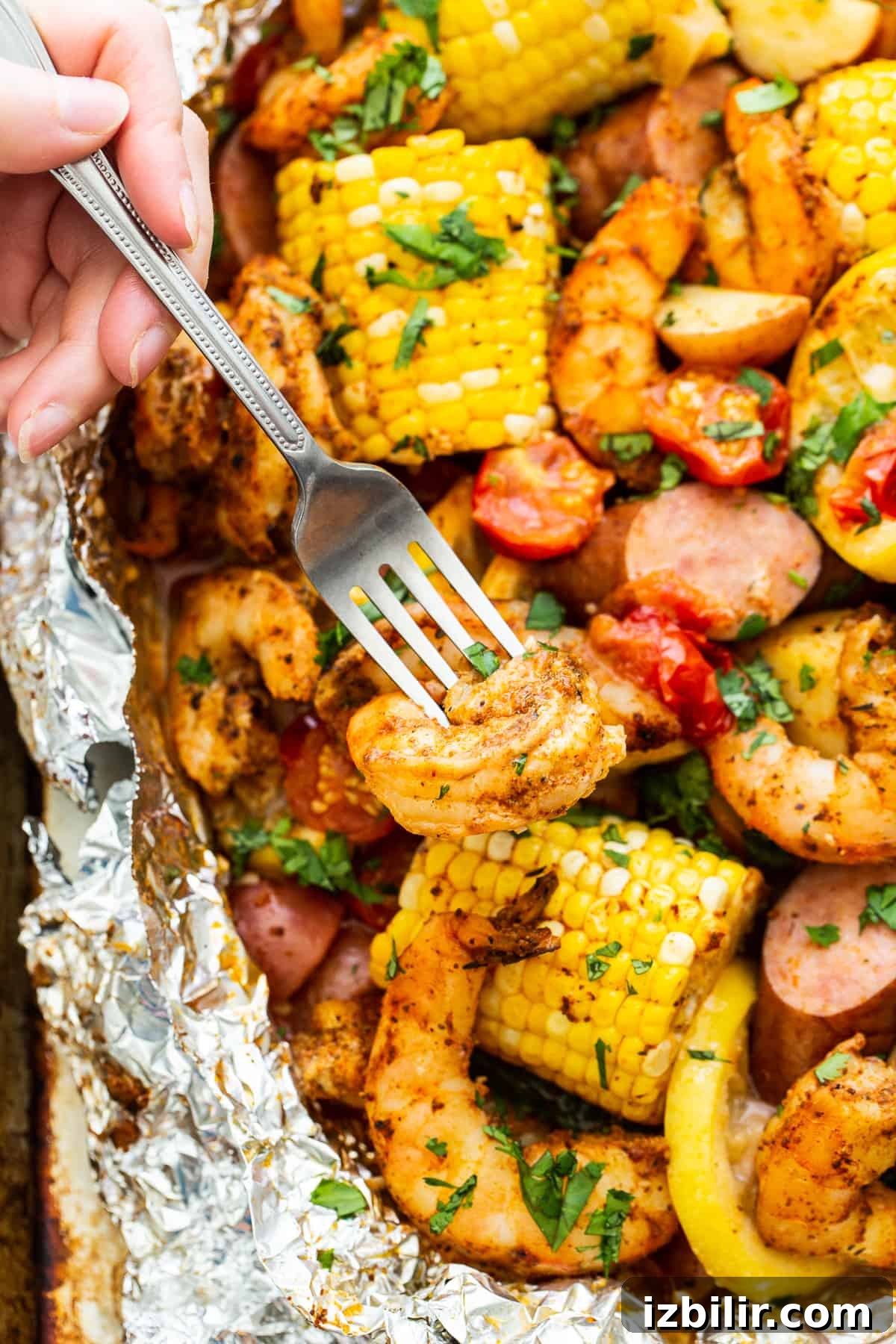 A fork full of shrimp.