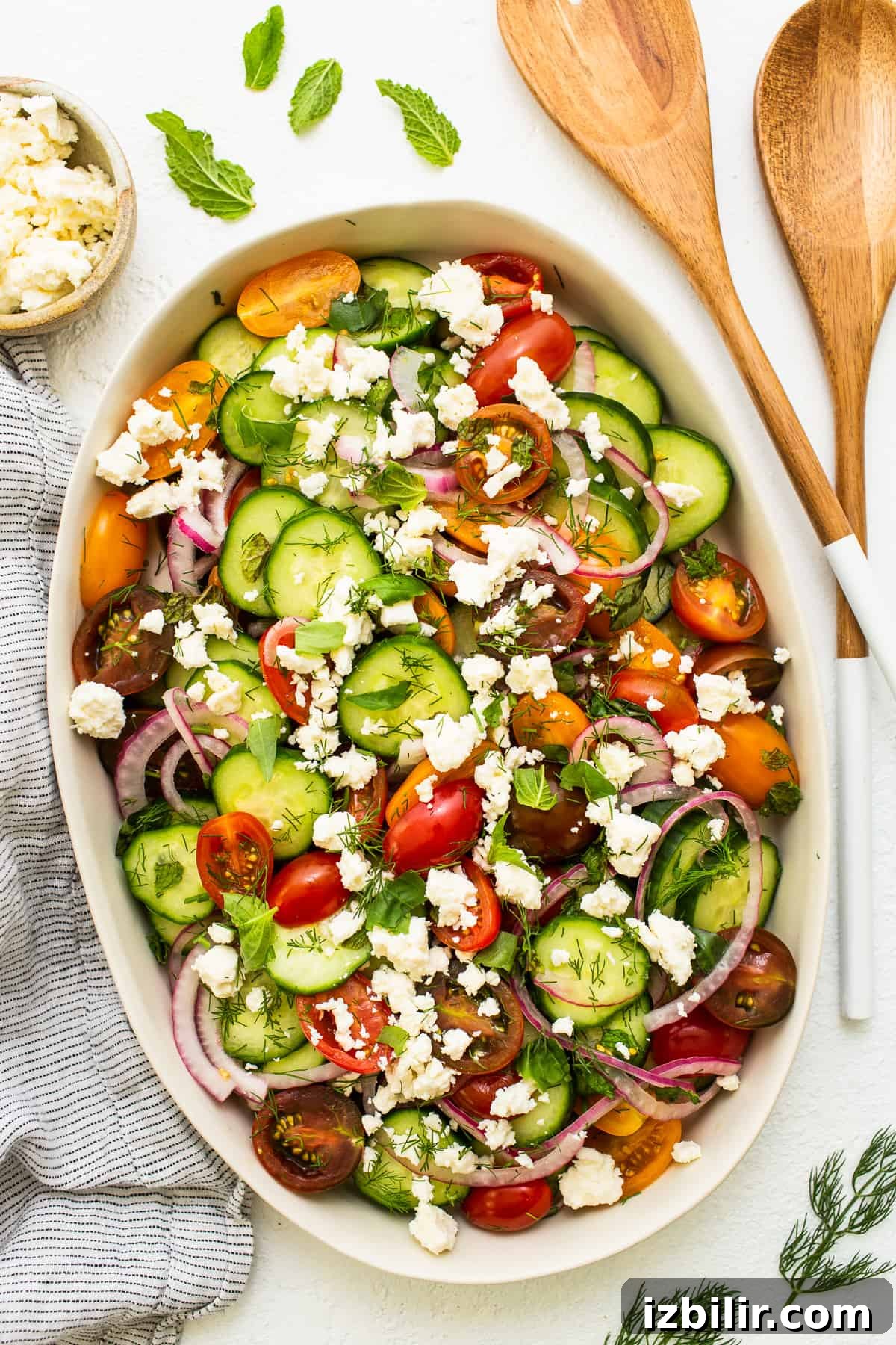 Fresh Cucumber and Tomato Salad with Herbs 2 Cucumber Tomato Salad in a serving platter.