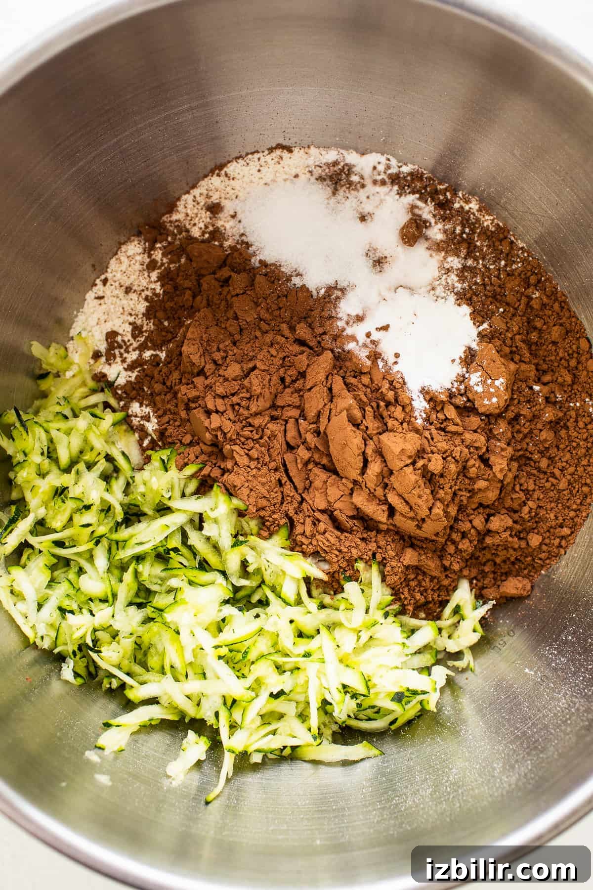 Dry ingredients for chocolate zucchini bread in a bowl.