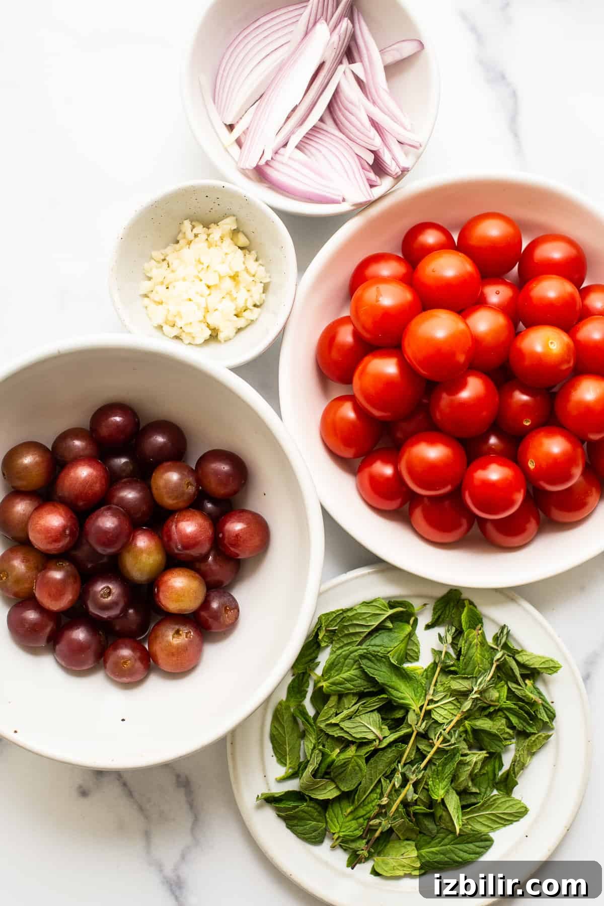 Creamy Burrata with Bursting Cherry Tomatoes Recipe 3 ingredients on countertop.