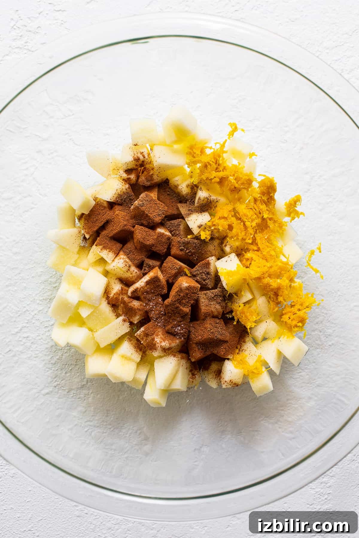 Mini apple crisps are a fun way to serve traditional apple crisps but in a single serving. apple crisp filling in bowl.