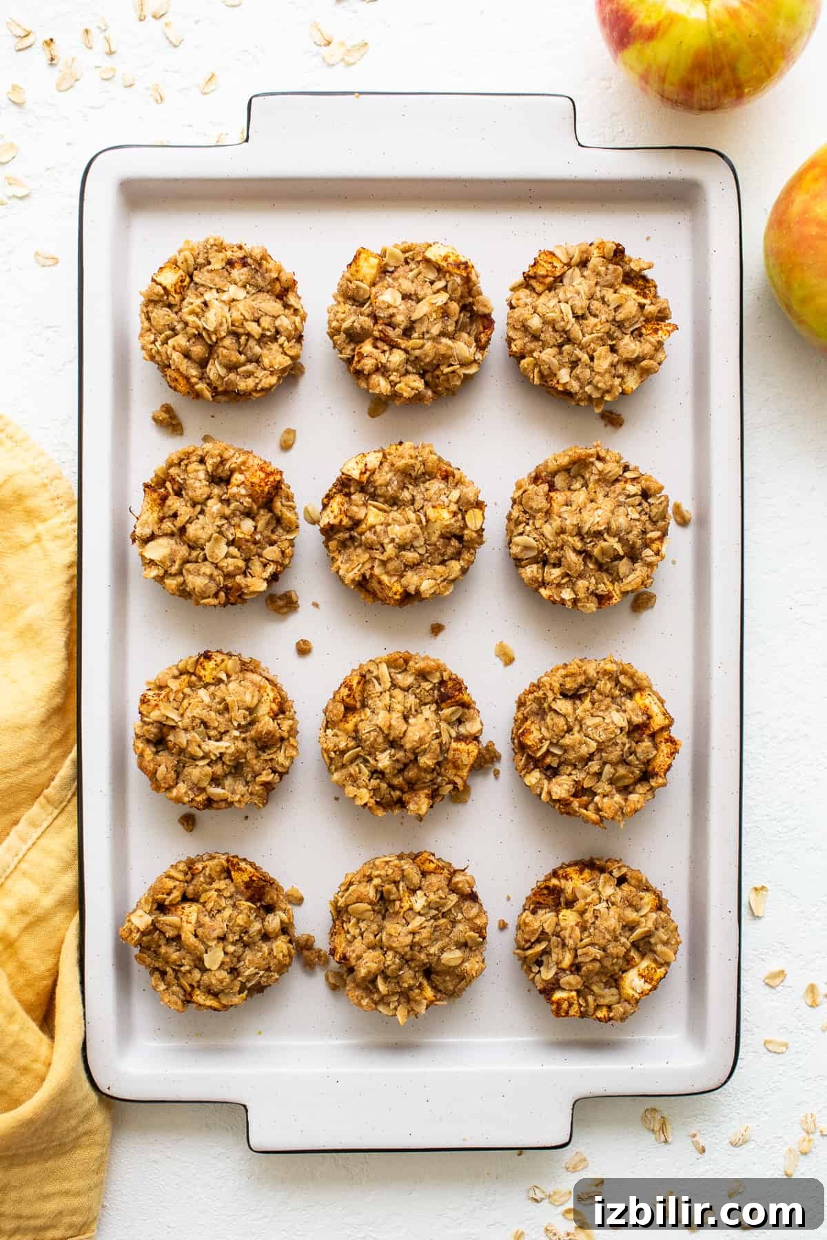Mini apple crisps are a fun way to serve traditional apple crisps but in a single serving. mini apple crisps on platter.