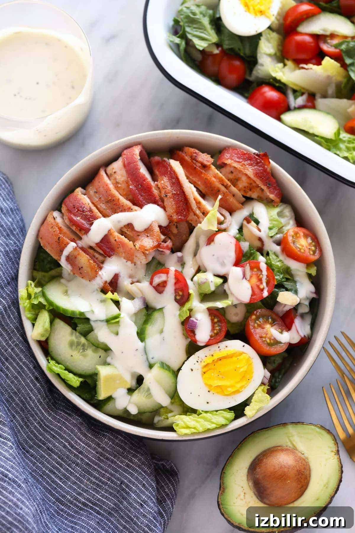This crunchy bacon wrapped chicken salad is packed with veggies, hard boiled eggs, homemade ranch dressing, and flavorful bacon wrapped chicken! chicken salad with ranch dressing