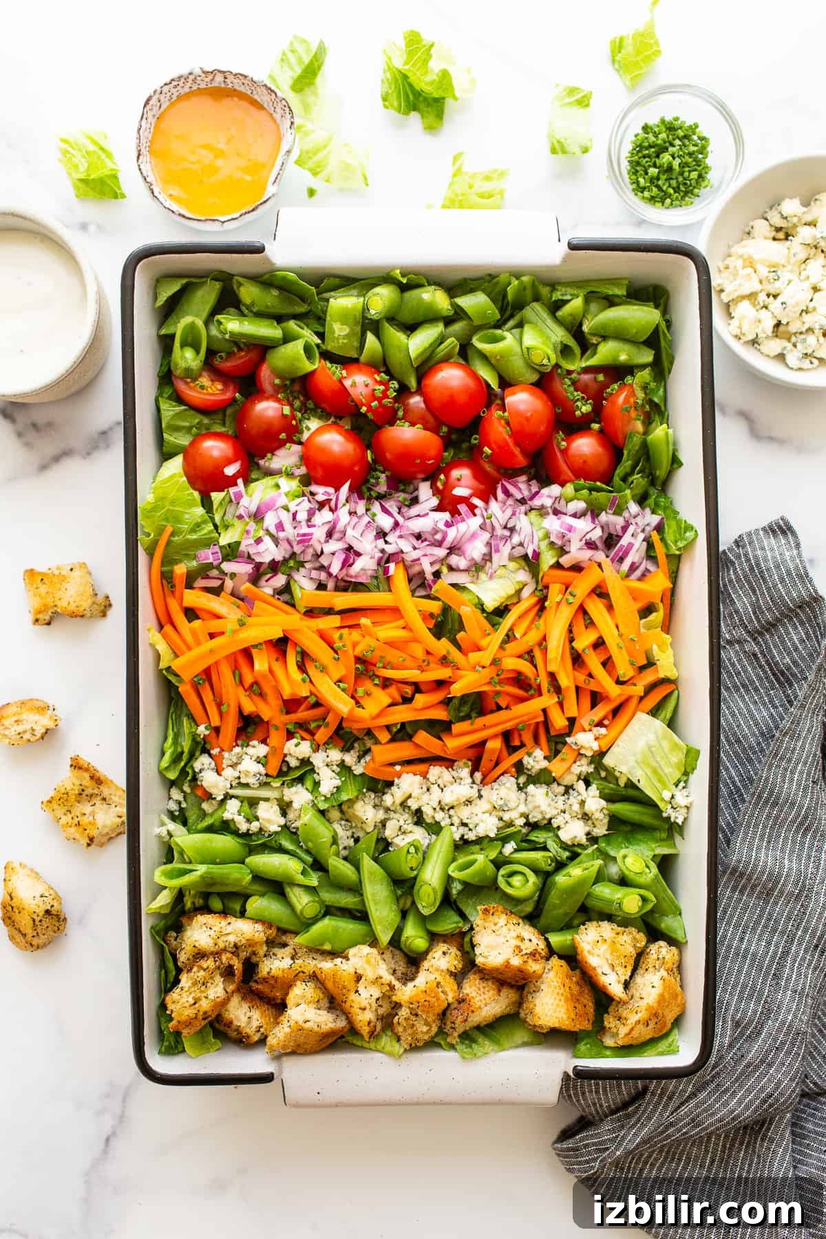 Garden salad with croutons Garden salad in a serving dish topped with homemade croutons.