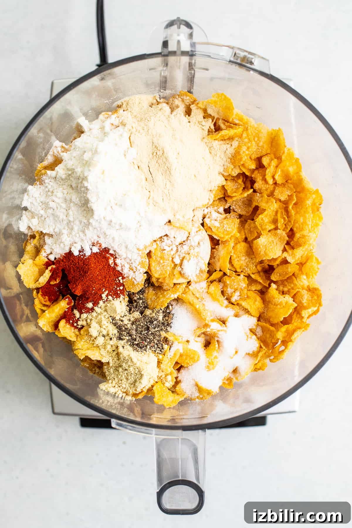 Cornflake breading Corn flakes and spices in food processor.