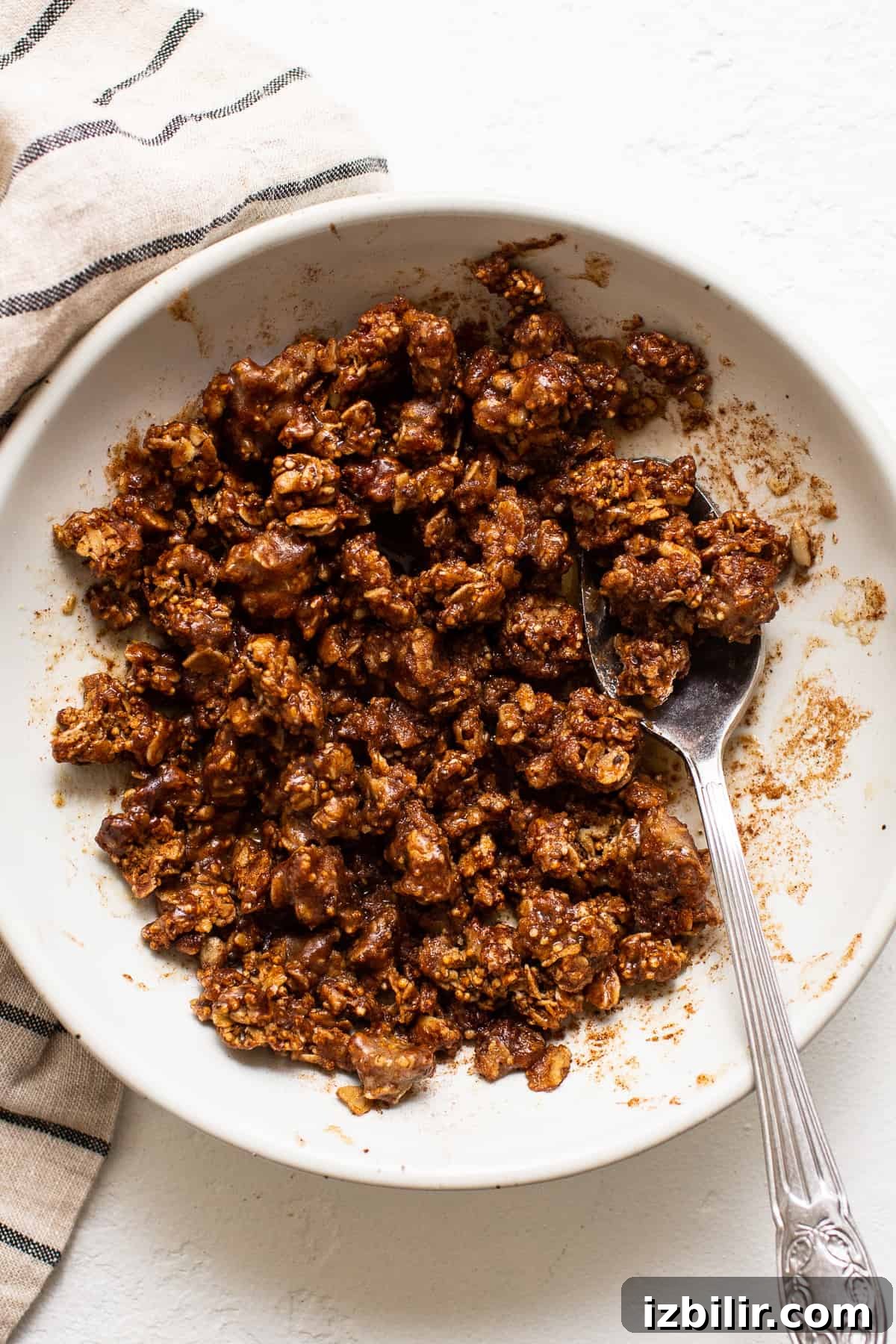 Granola streusel in a bowl. Baked apple streusel filling in a bowl.