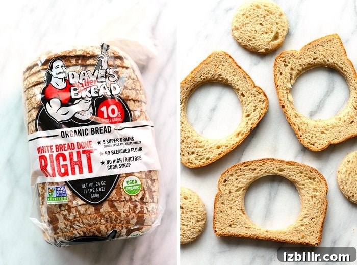 White bread with centers cut out for Eggs in a Basket white bread with centers cut out from a cookie cutter
