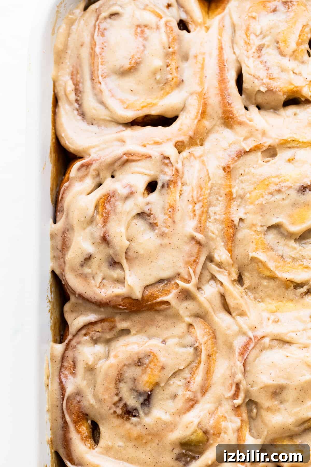 Apple cinnamon rolls with brown butter cream cheese frosting.